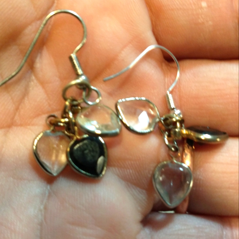 Black and clear crystal earrings on hooks.
